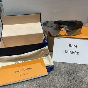 Louis Vuitton sunglasses. “Purple Rain” silver/gold size W. Brand new